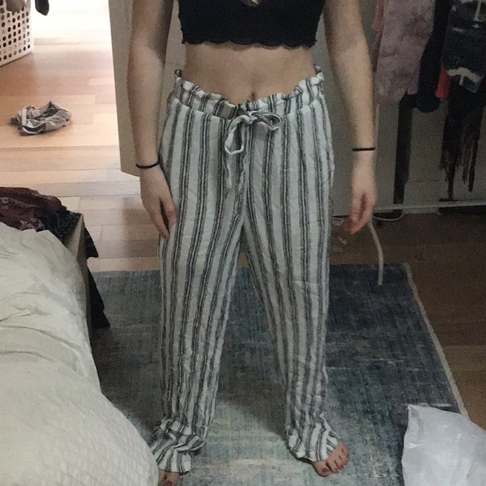 Black and white striped pants
